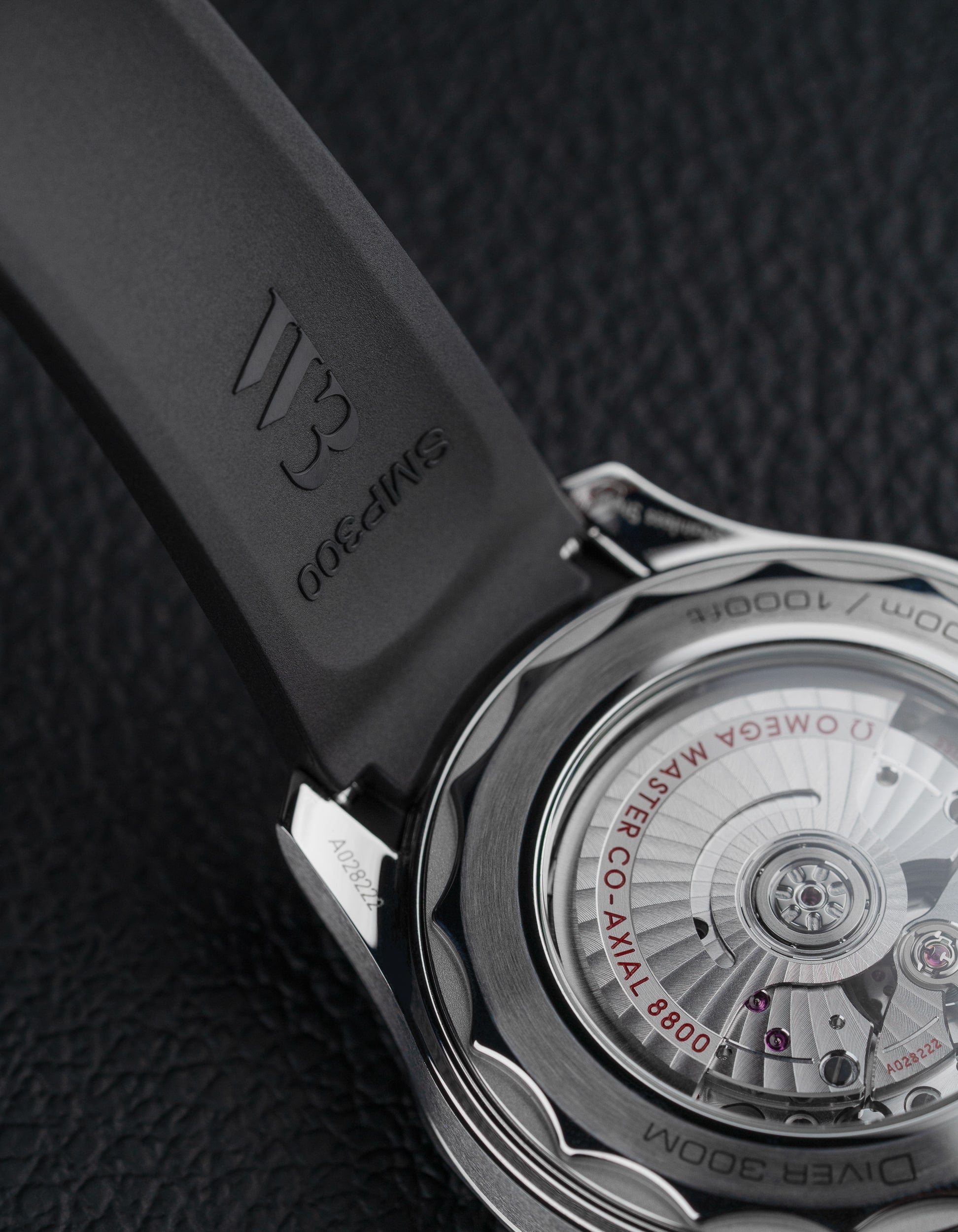 Black Rubber Strap on an watch with dark background