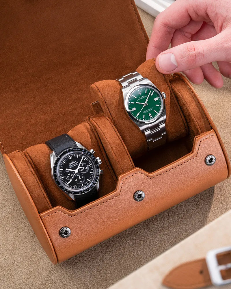 2 Slot Watch Roll in Brown displaying two luxury watches, highlighting its protective and elegant interior design.