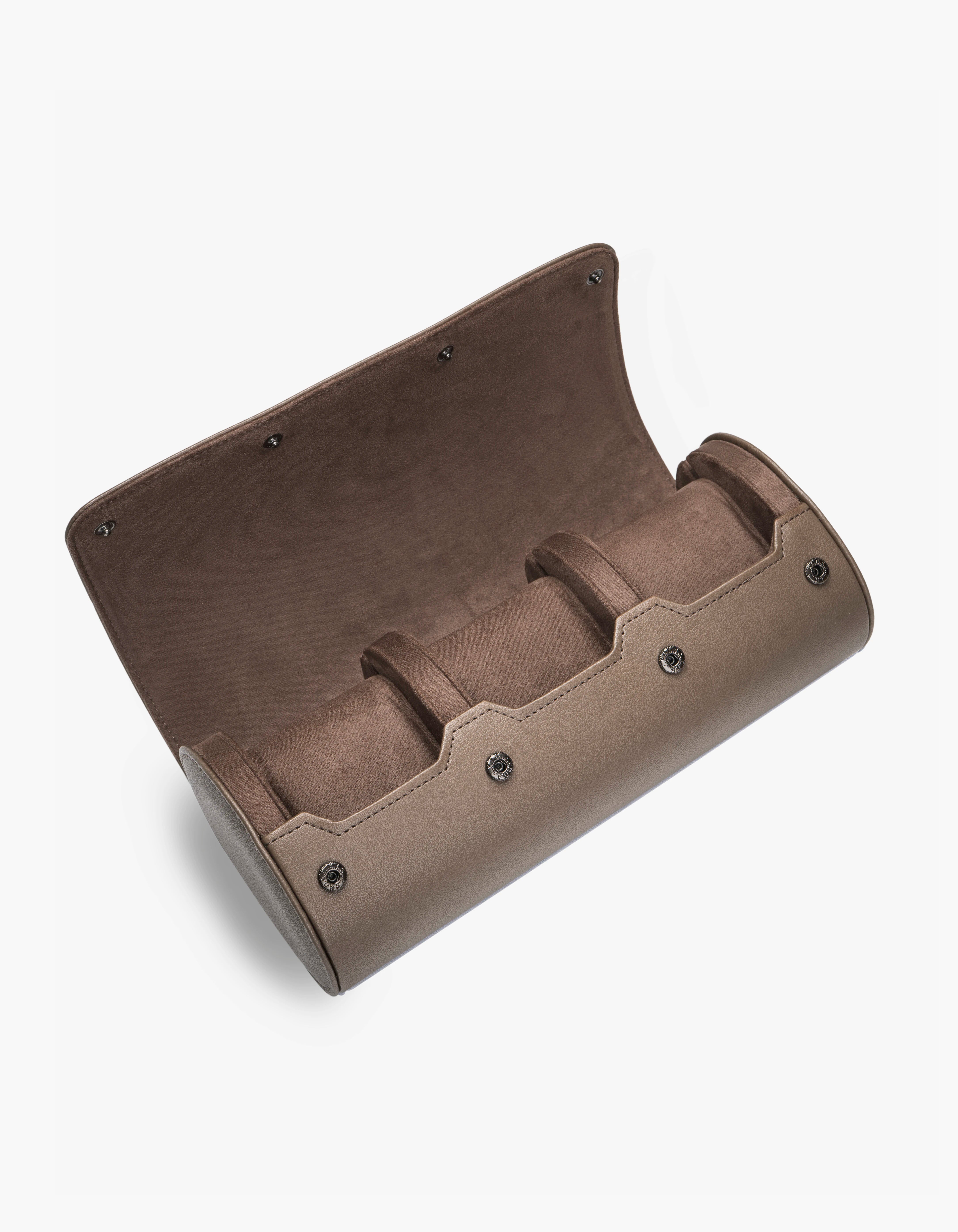 Beige Taupe leather watch rolls with three compartments on a white background
