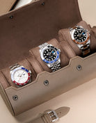 Opened 3 Slot Watch Roll in taupe with three Rolex watches inside