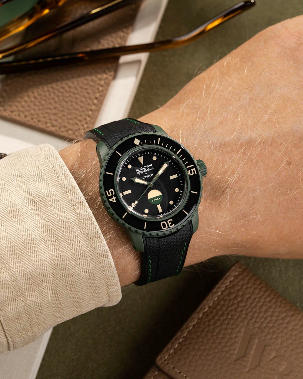 Vertech Black rubber strap with green stitching on Blancpain x Swatch Green Abyss – wrist shot