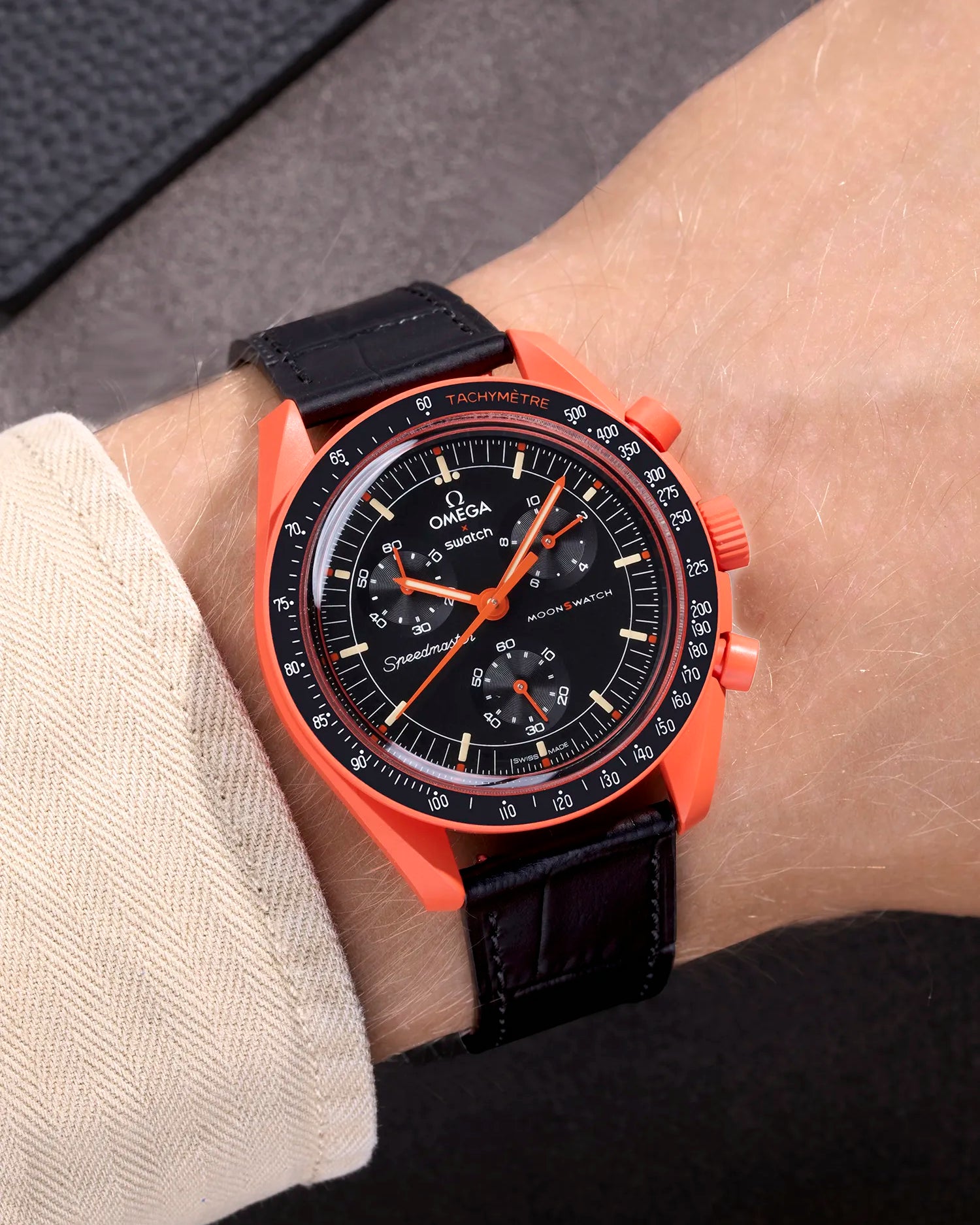 Black Embossed Alligator leather strap on Omega X Swatch MoonSwatch Mission on Earth Lava – wrist shot