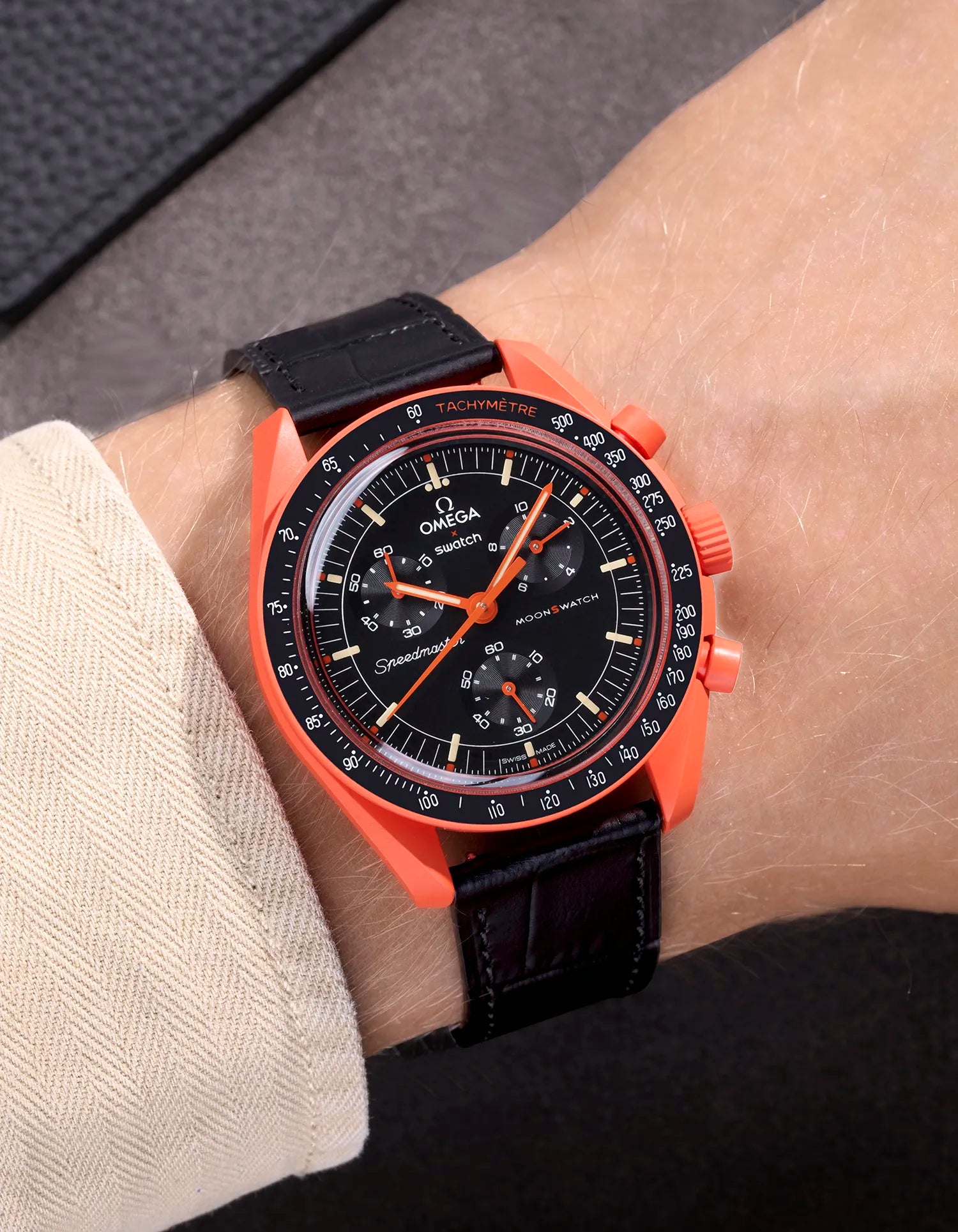 Black Embossed Alligator leather strap on Omega X Swatch MoonSwatch Mission on Earth Lava – wrist shot