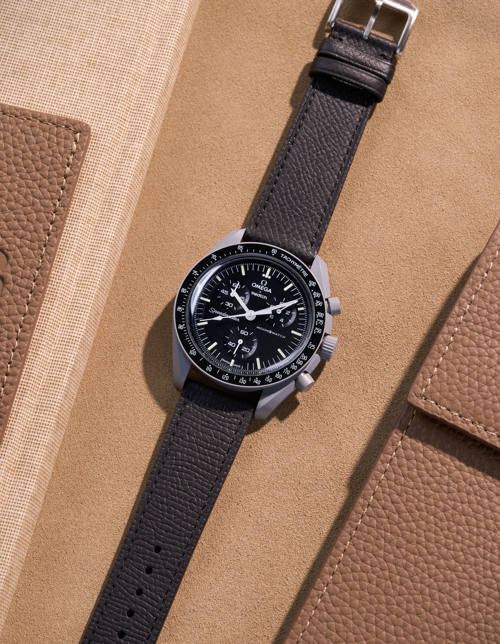 Flat lay of Black Epsom leather strap for Omega x Swatch MoonSwatch Mission to the Moon