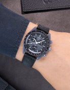 Omega X Swatch Mission to Mercury with Black suede leather strap worn on wrist