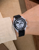 Omega X Swatch Mission to Earthphase with black suede leather strap worn on wrist