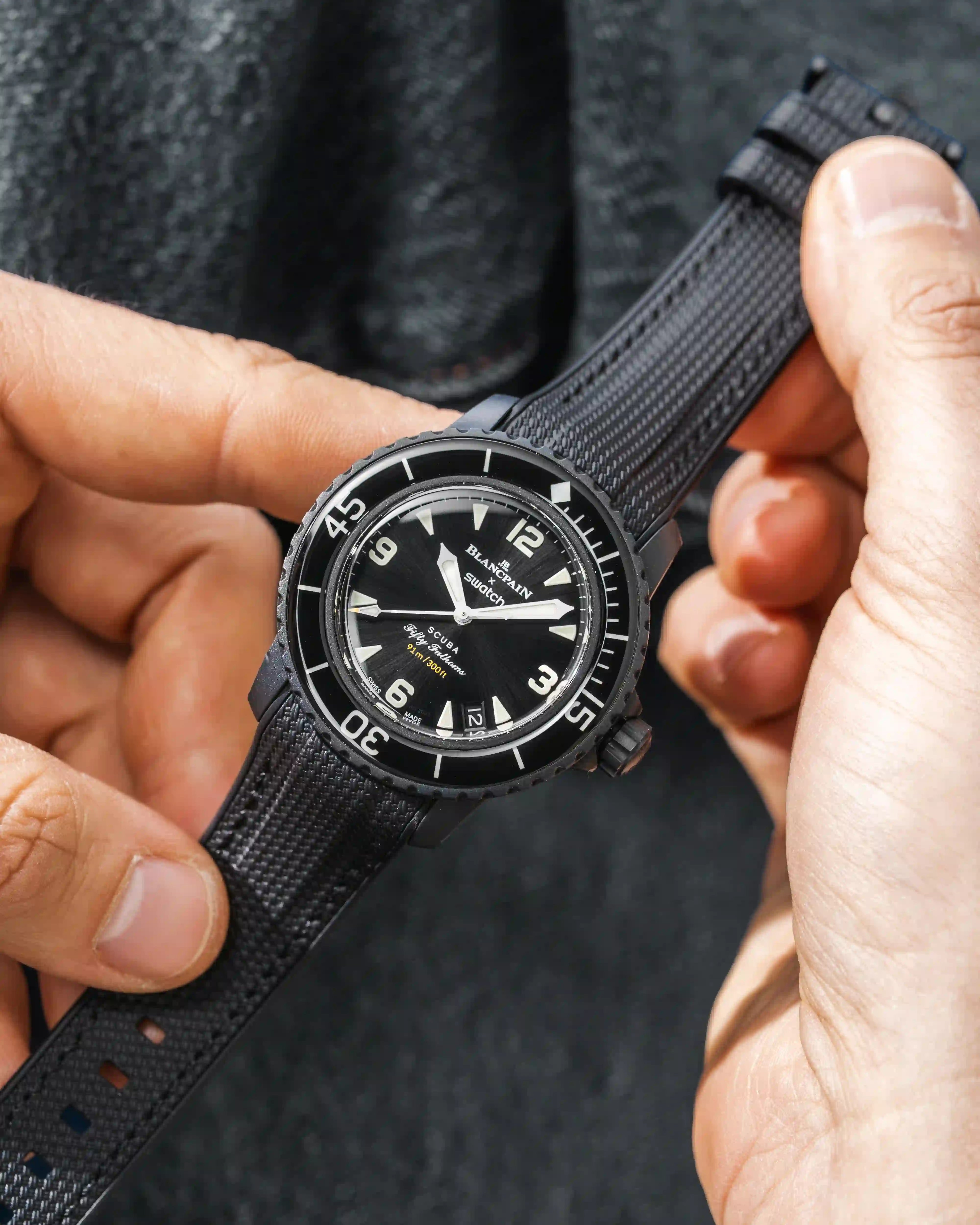 Black Vertech Rubber Strap for Blancpain X Swatch The Ocean Of Storms - flat lay with black background