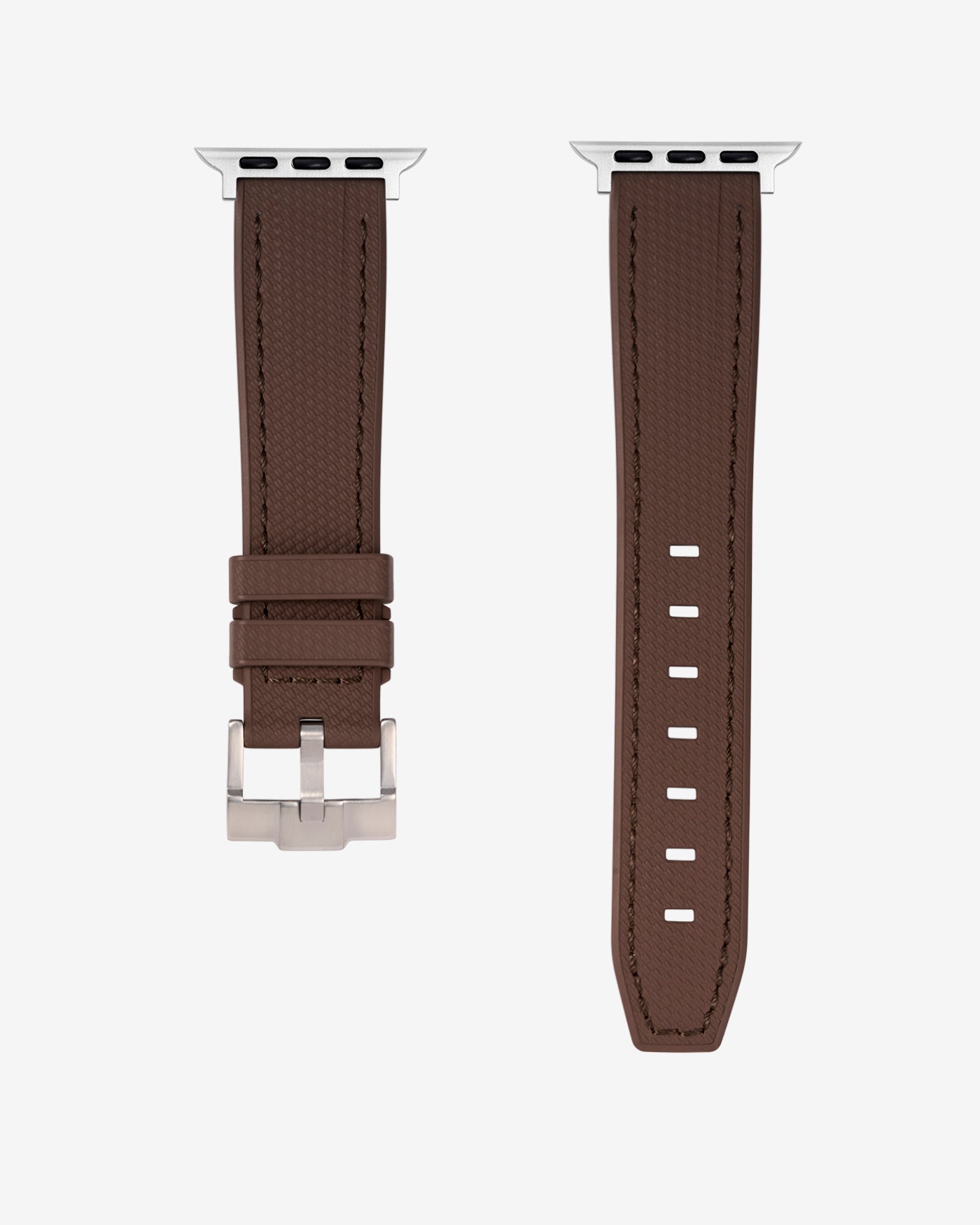 A Brown rubber apple watch band in detail with silver buckle