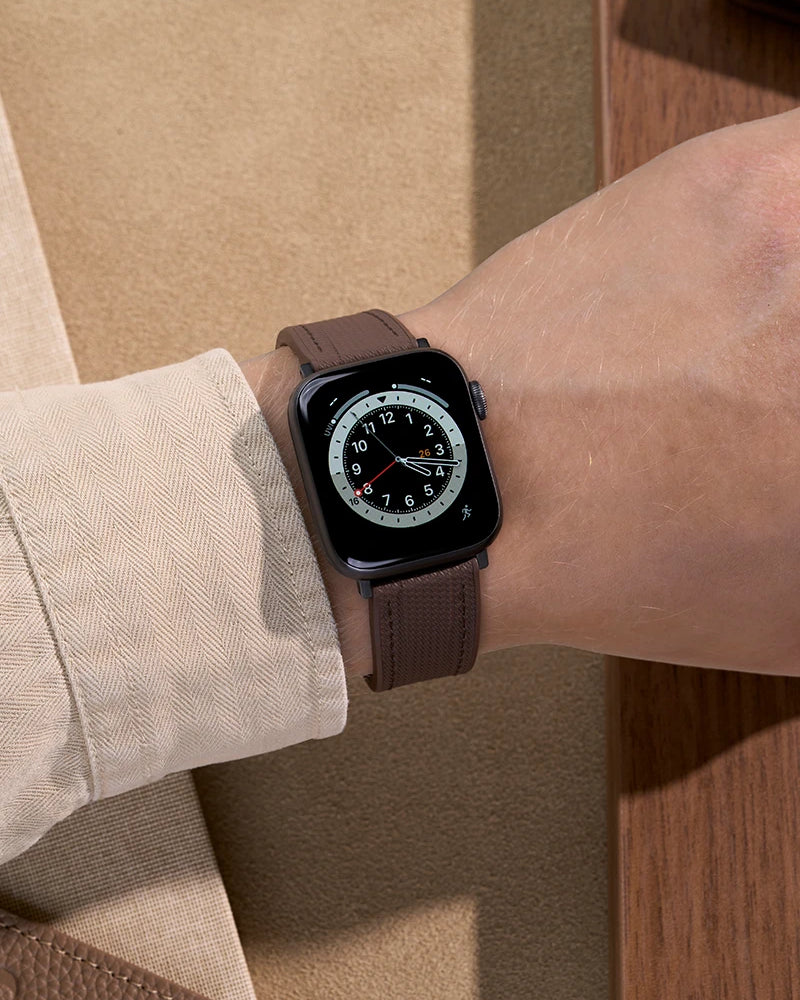 Active lifestyle wrist shot – Brown Apple Watch band with