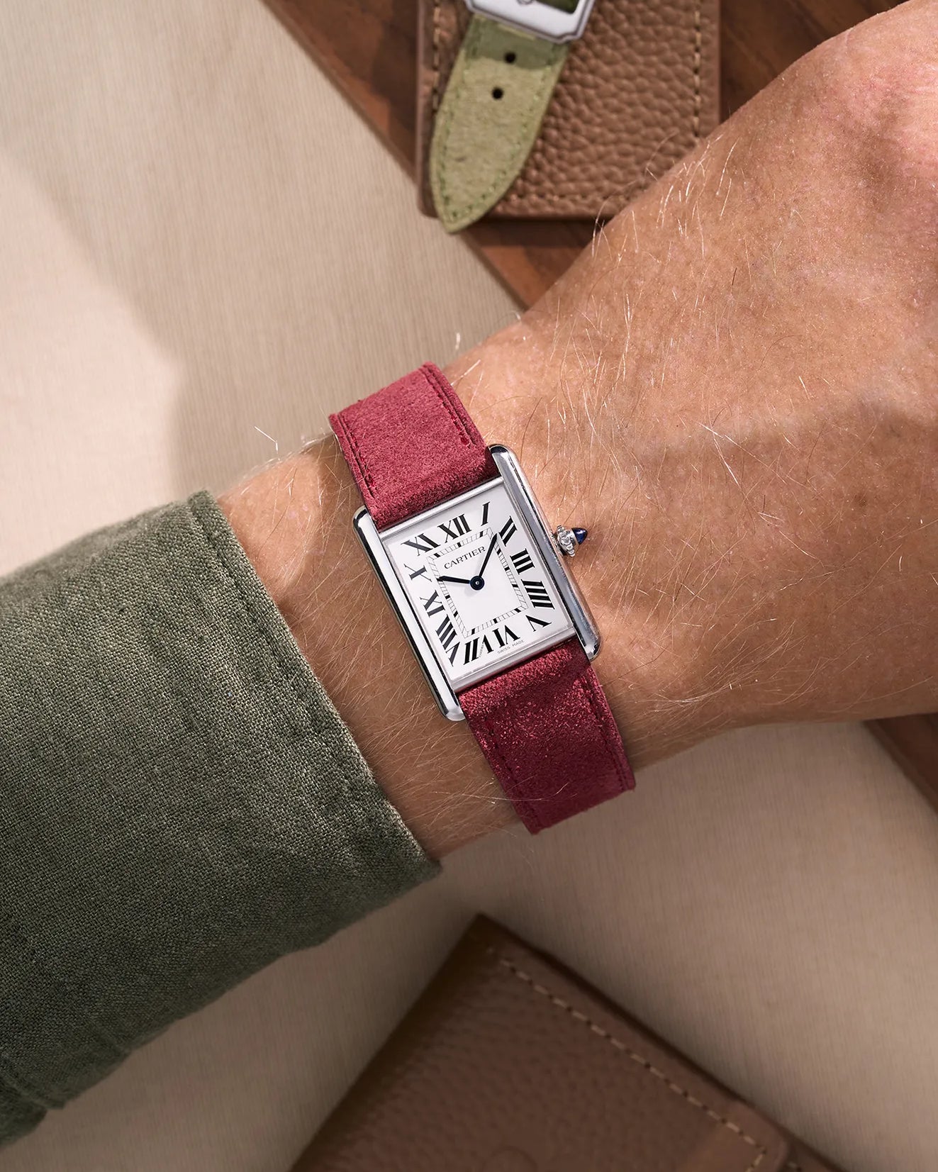 Burgundy suede strap worn with silver cartier tank watch | deep red leather variant from multi-color suede series