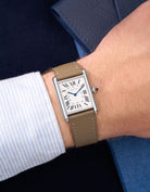 Taupe Cowhide Leather Straps for Cartier Tank Must Large wrist shot over blue table