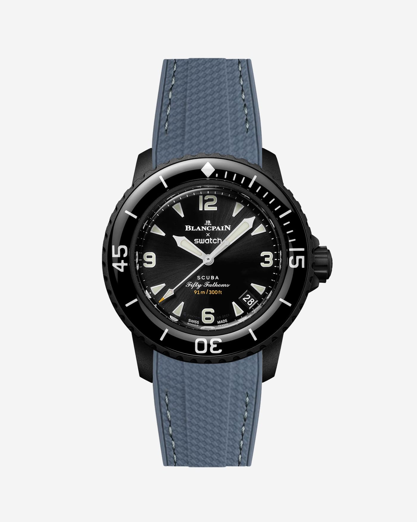 Blancpain X Swatch The Ocean of Storms diver watch displayed with grey rubber strap with green stitches mounted
