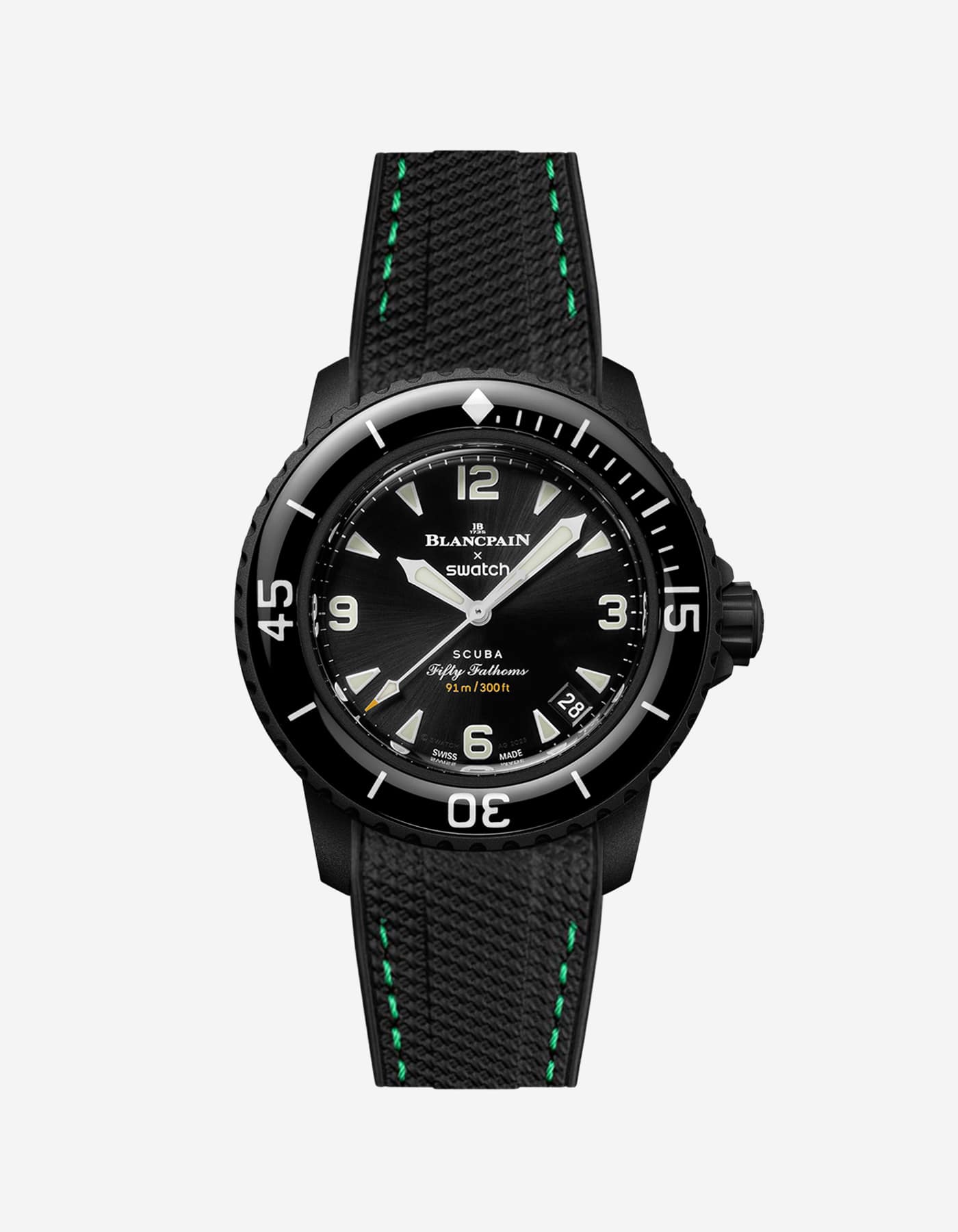 Blancpain X Swatch The Ocean of Storms diver watch displayed with black rubber strap with green stitches mounted