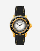 Black vertech rubber strap with yellow stitches fitted on Blancpain Swatch Pacific Ocean diver watch, front view