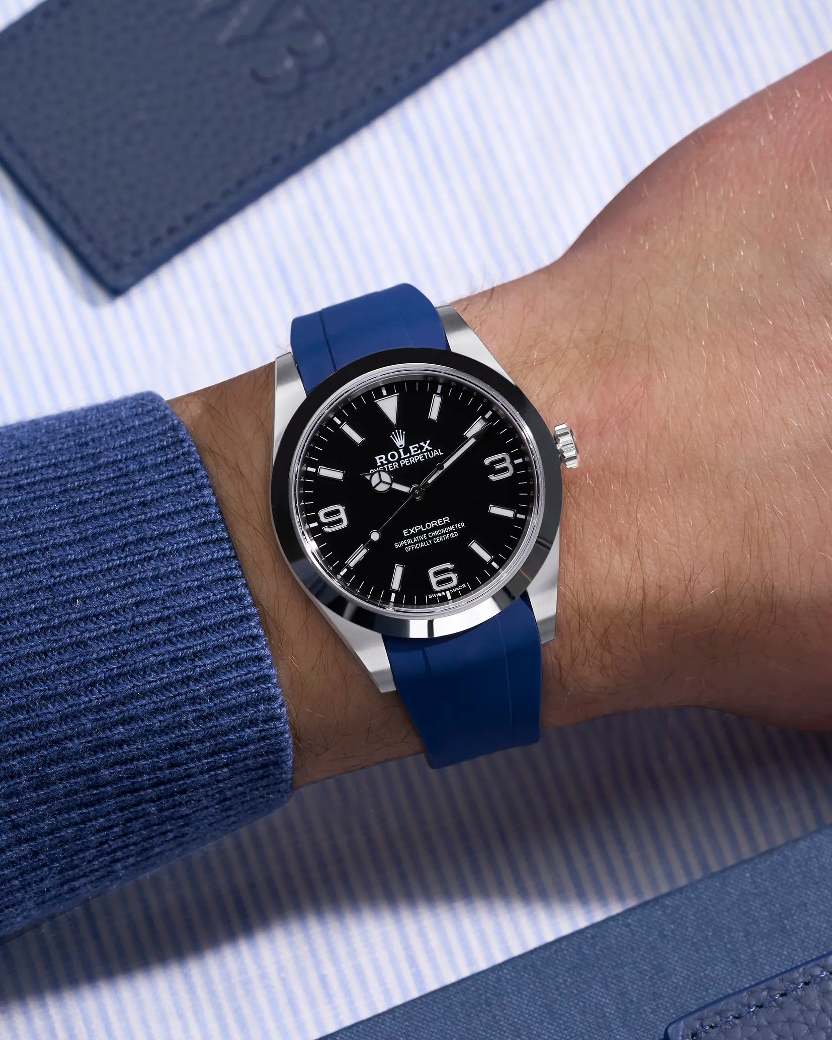 Blue rubber strap for Rolex Explorer 214270 with original clasp – wrist shot showing seamless integration