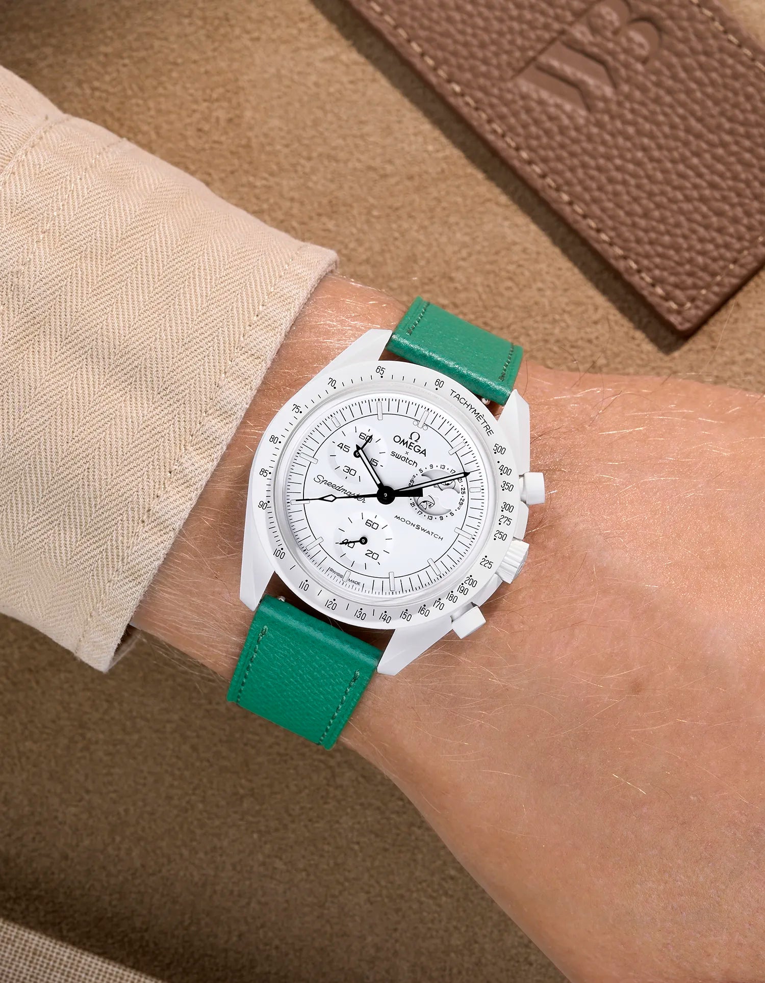 Omega X Swatch Mission to the Moonphase Full Moon with Green epsom leather strap worn on wrist