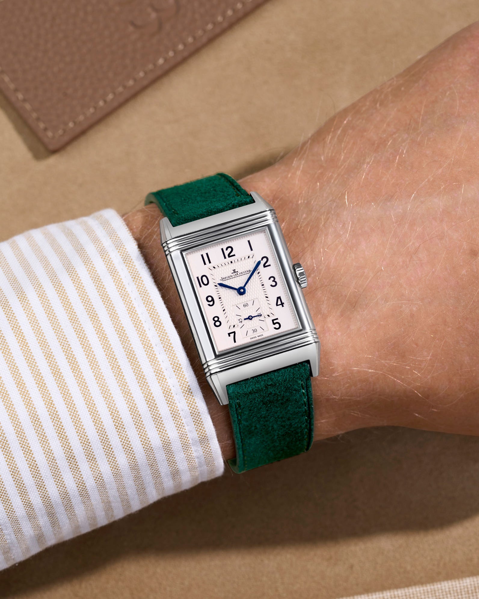 Green suede leather watch strap on a JLC Reverso steel watch. Handmade in italy in lug width 17mm to 21mm