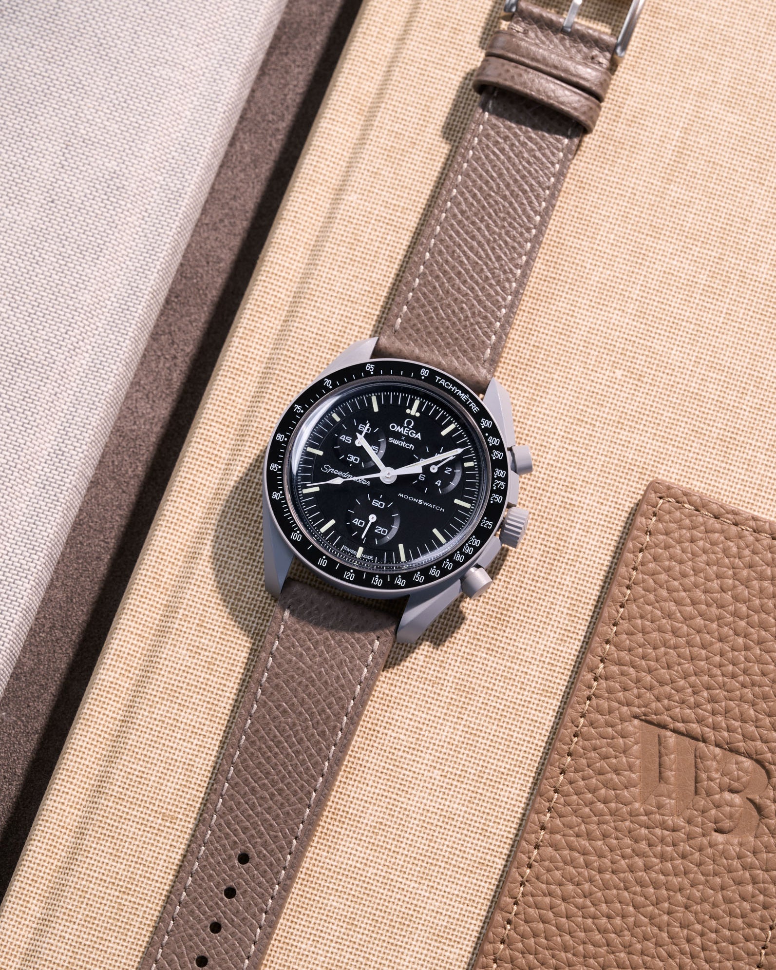 Flat lay of Grey Epsom leather strap for Omega x Swatch MoonSwatch Mission to the Moon