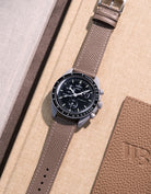 Flat lay of Grey Epsom leather strap for Omega x Swatch MoonSwatch Mission to the Moon