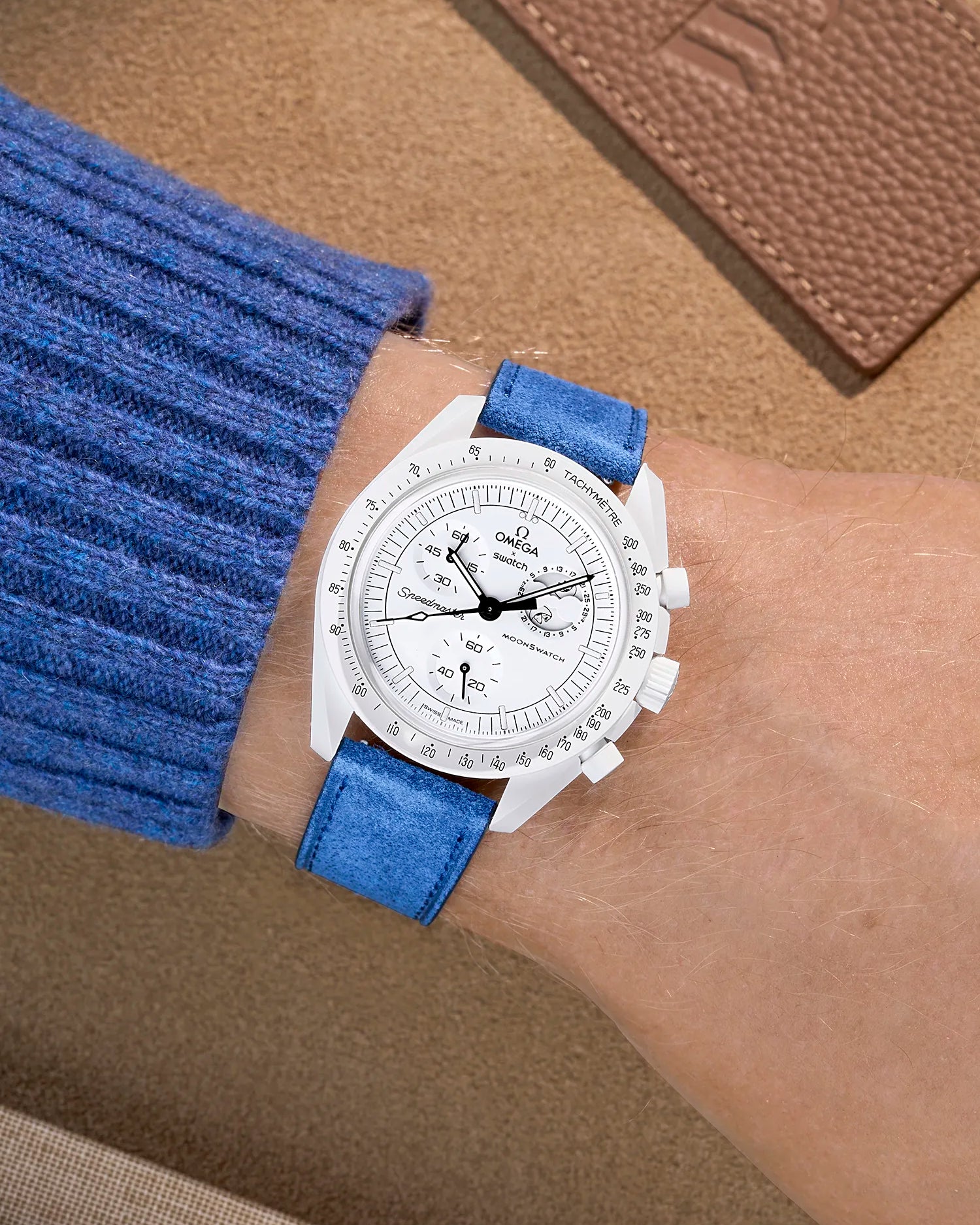 Omega X Swatch Mission to the Moonphase Full Moon with Ocean Blue suede leather strap worn on wrist