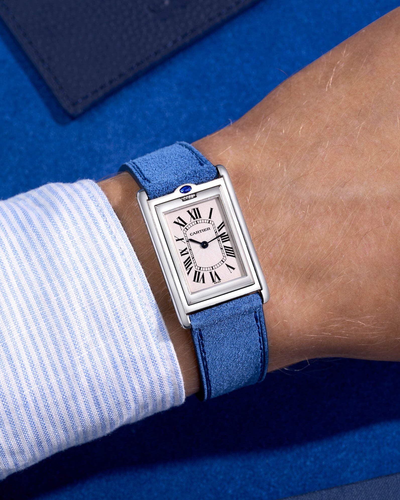 Ocean Blue suede watch strap on Cartier silver watch wrist shot