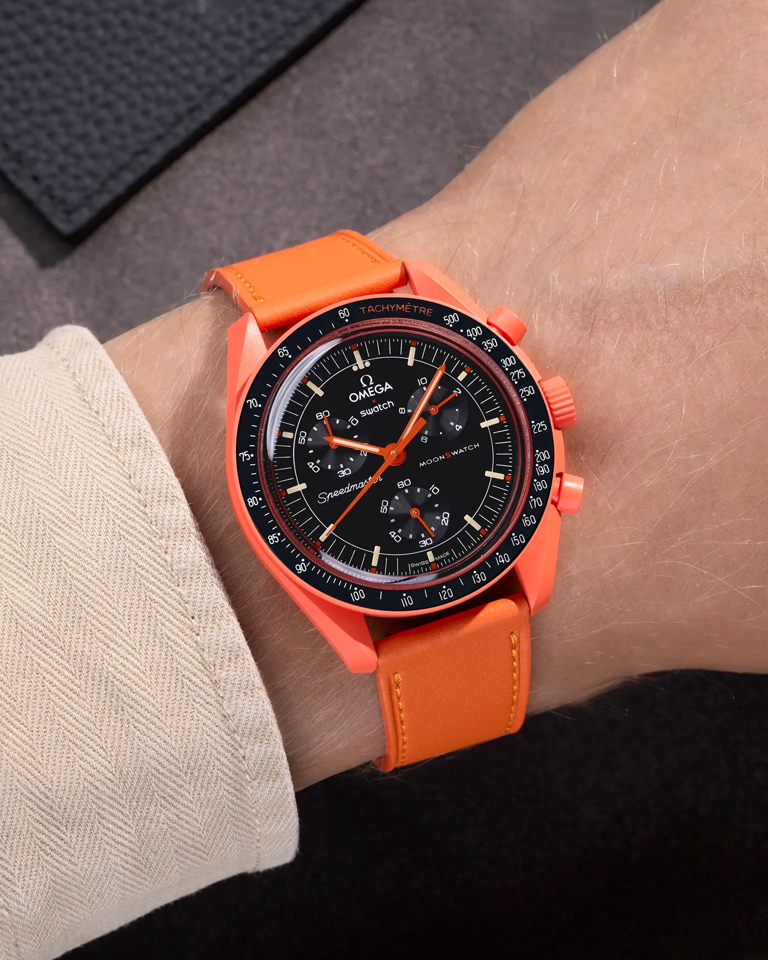 Orange Cowhide leather strap on Omega X Swatch MoonSwatch Mission on Earth Lava – wrist shot