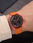 Orange Embossed Alligator leather strap on Omega X Swatch MoonSwatch Mission on Earth Lava – wrist shot