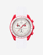 Omega watch with red accents and a white strap on a light gray background