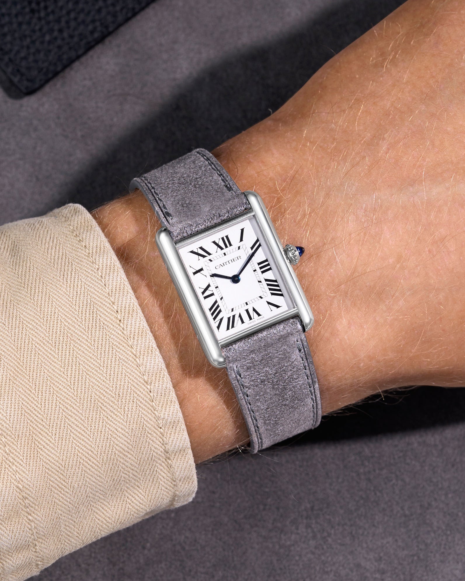 light grey suede leather watch strap on Cartier Santos Large wrist shot