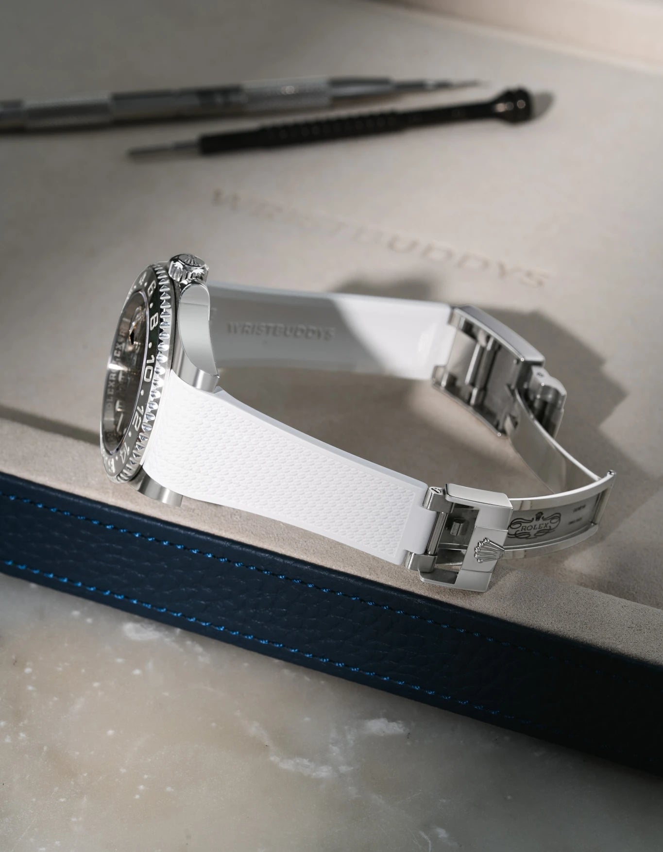 White Vertech FKM rubber strap for Rolex GMT-Master II 116710, premium integrated replacement for original clasp, shown on a white valet tray.