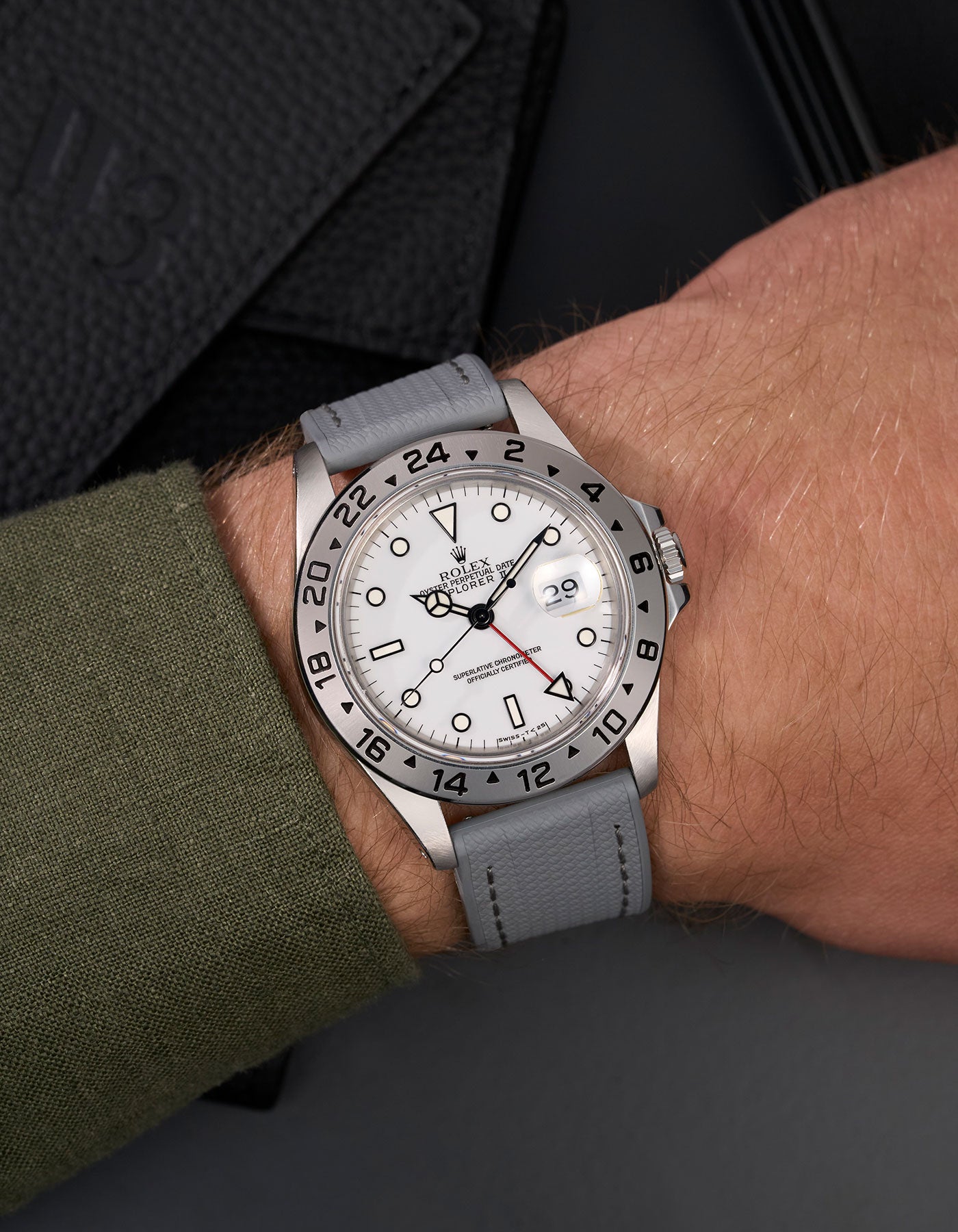 Wrist shot of Rolex Explorer II 16570 with Straight End Vertech FKM Strap 20mm in grey, showing texture and fit on wrist in natural light
