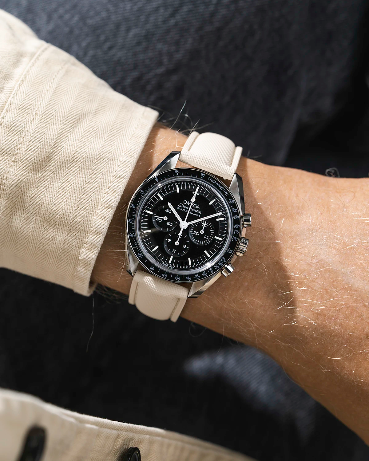 Sailcloth FKM Rubber Strap in Beige With Deployant Clasp wrist shot on Omega Speedmaster watch