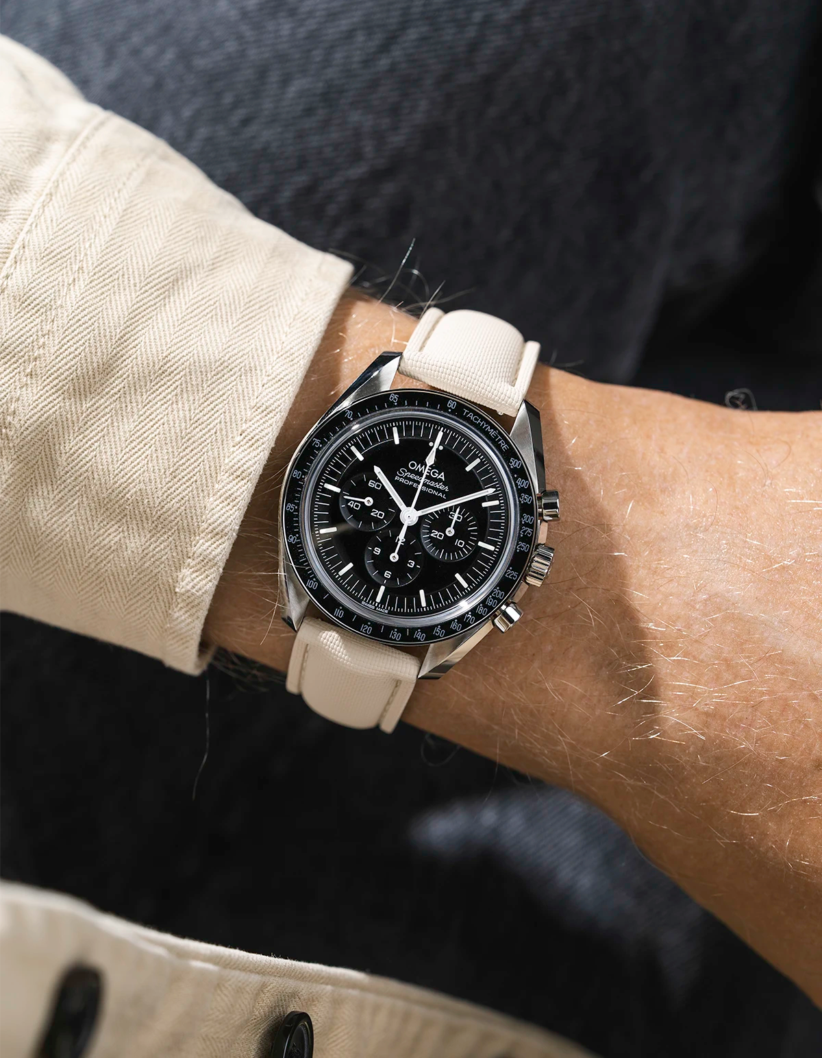 Sailcloth FKM Rubber Strap in Beige With Deployant Clasp wrist shot on Omega Speedmaster watch