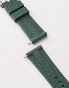 Panerai strap tubes shown in action on a green Panerai strap