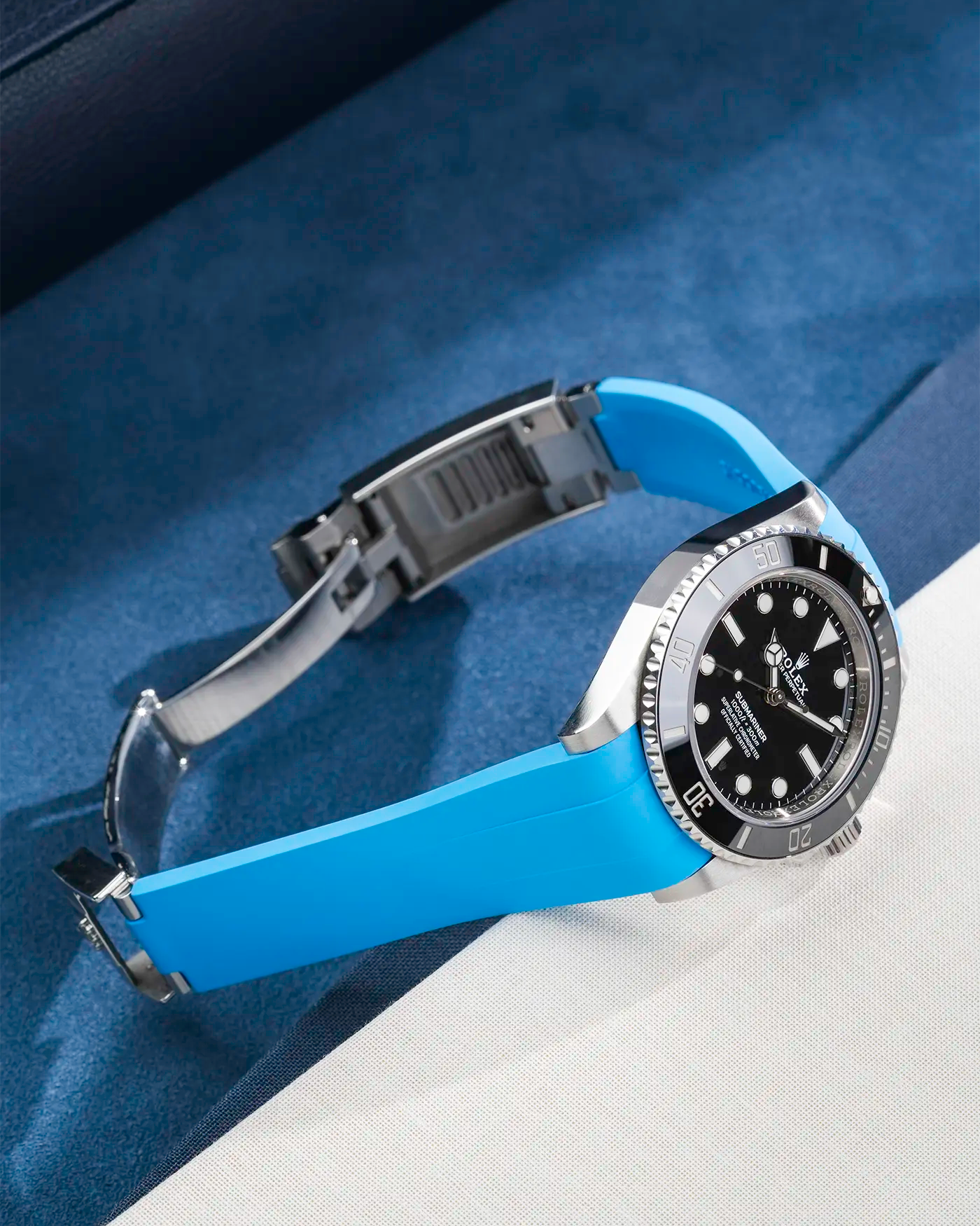 Capri Blue Classic Smooth FKM Rubber Strap fitted on Rolex Submariner 41 ref. 126610LN/124060LN, mounted on the watch with clasp open – product photo from the side