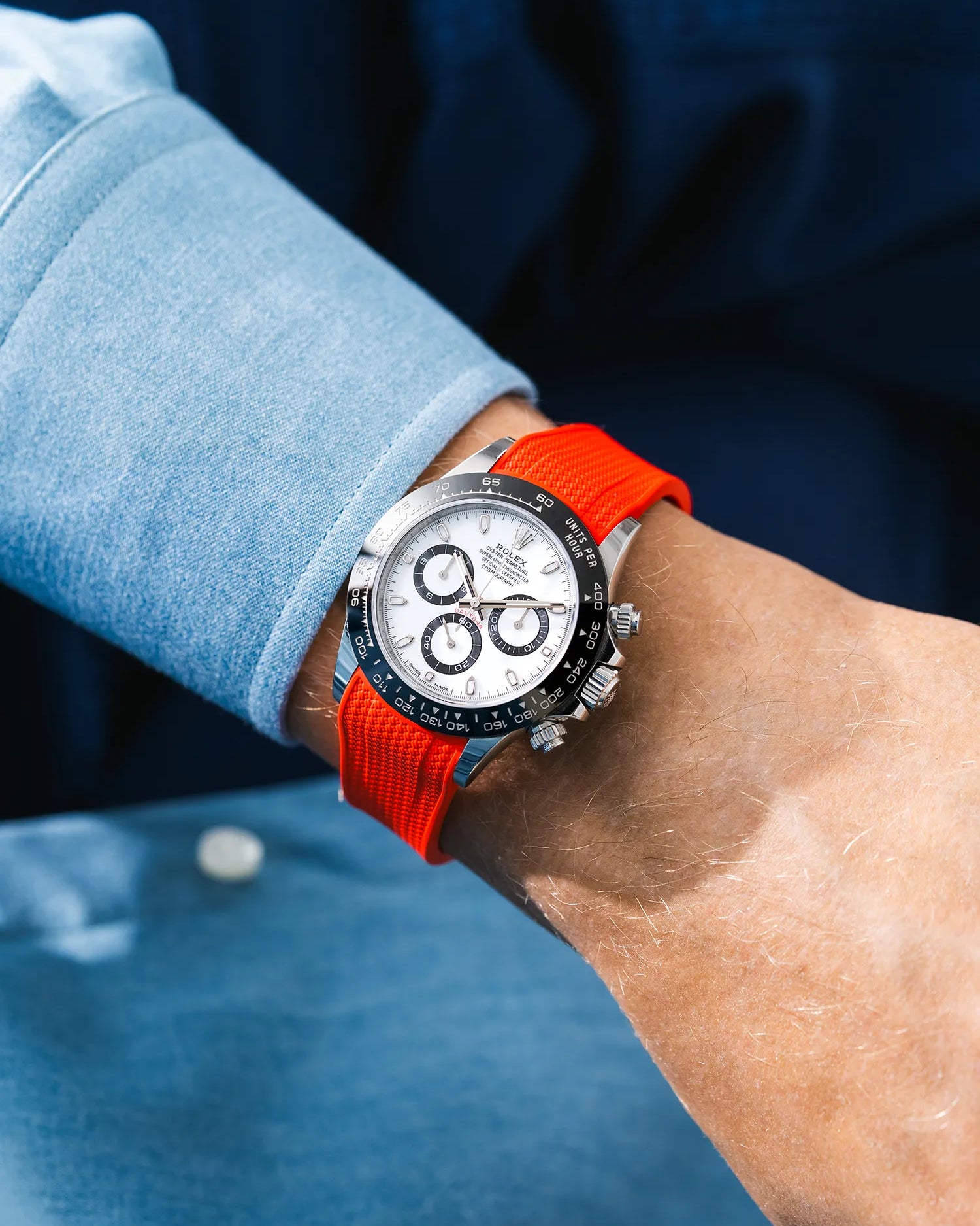 Vertech Red integrated FKM rubber strap with original clasp on Rolex Daytona 116500 white dial ceramic bezel wrist shot