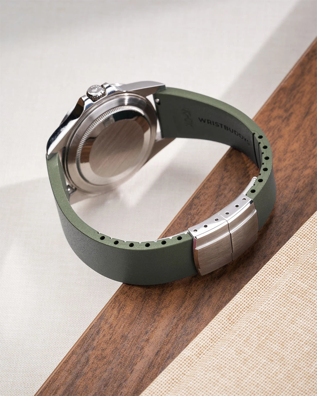 Green CTS FKM Rubber Strap 19-22mm lying flat to show the clasp closed
