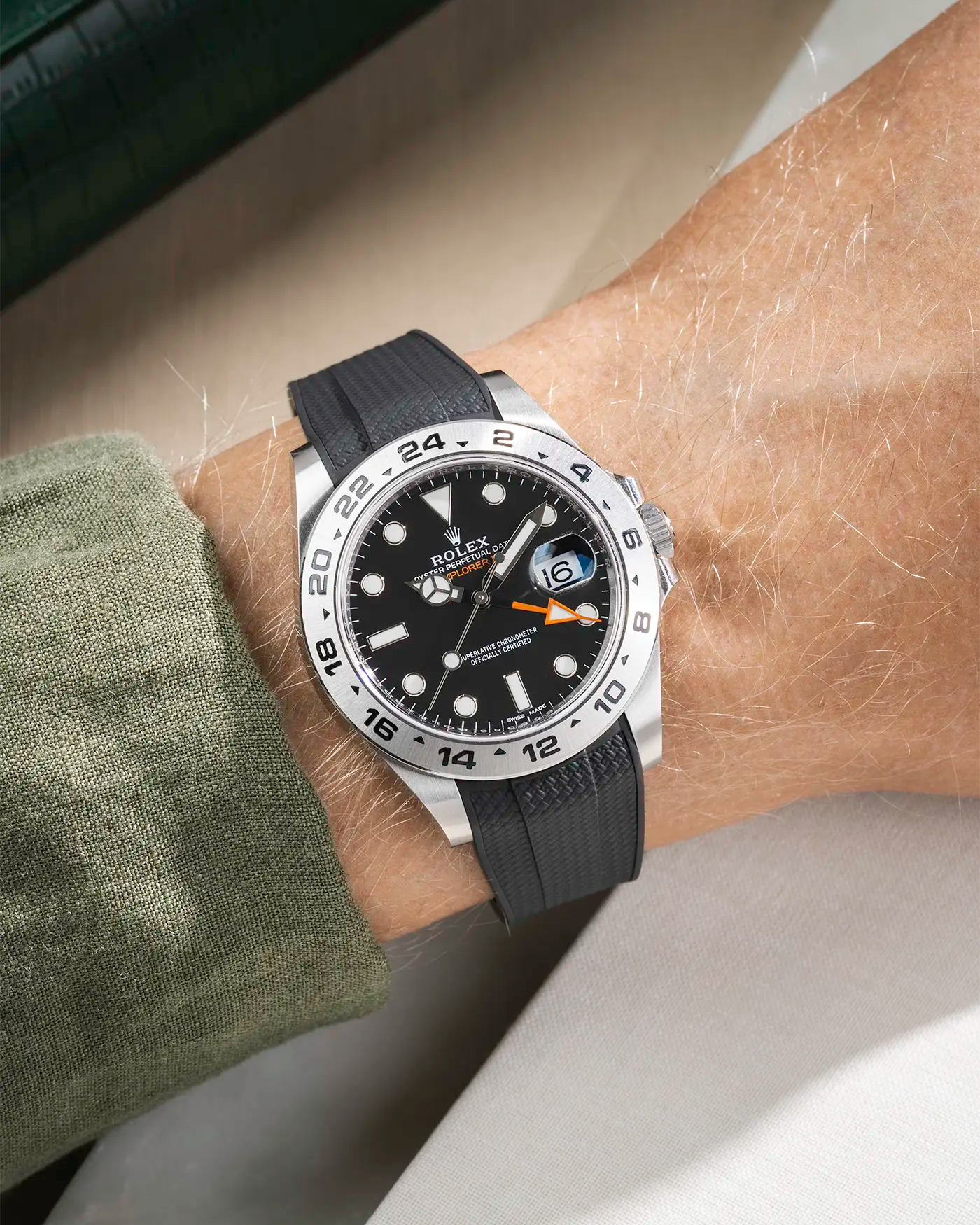 Wrist shot on Vertech FKM Rubber Strap in black with Integrated Original Clasp - Rolex Explorer 216570 on beige background