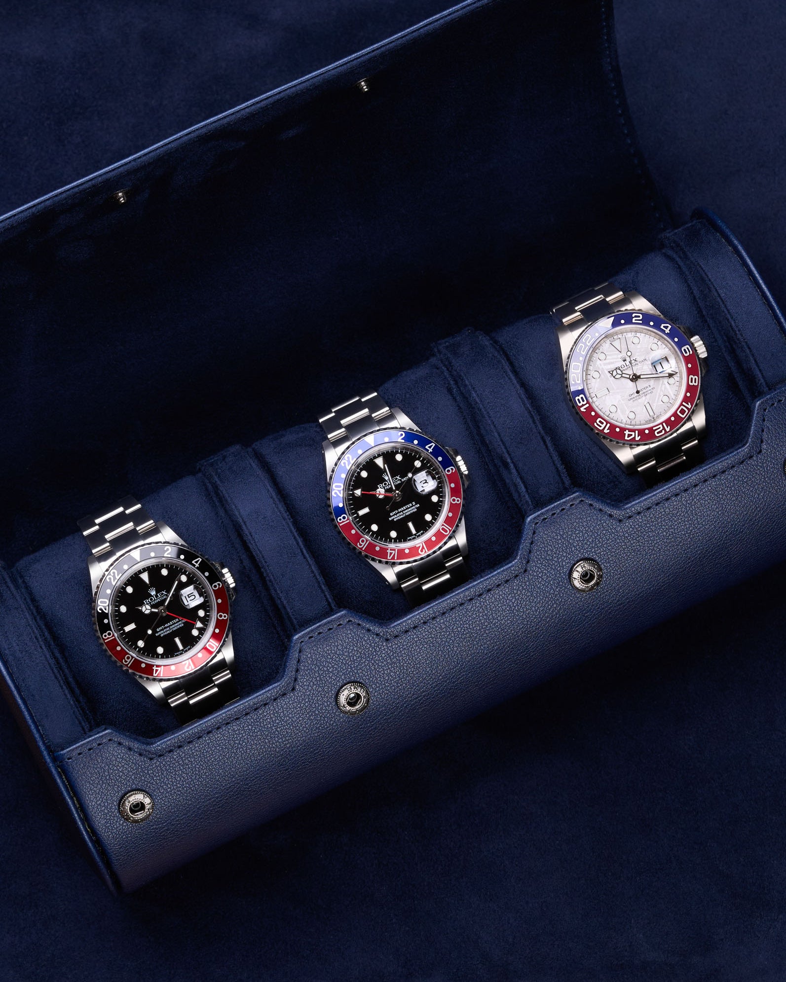 Opened 3 Slot Watch Roll in Navy Blue with three Rolex watches inside