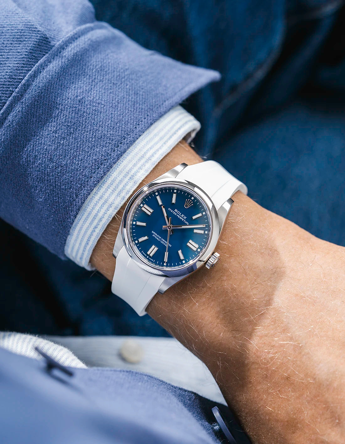 White integrated FKM rubber strap with original clasp on Rolex Oyster Perpetual 41 134300 blue dial wrist shot