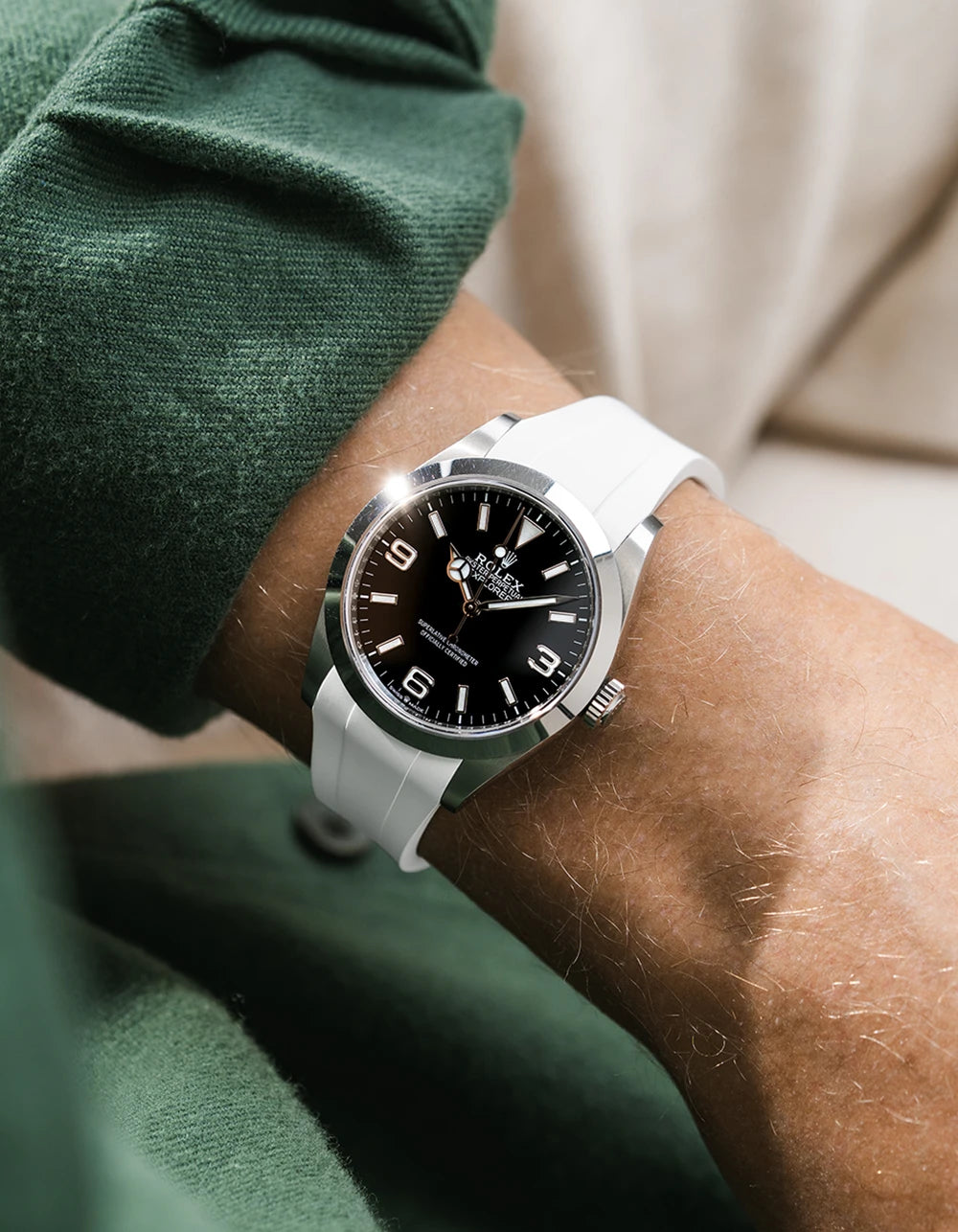 White integrated FKM rubber strap with original clasp on Rolex Explorer 40 224270 black dial wrist shot