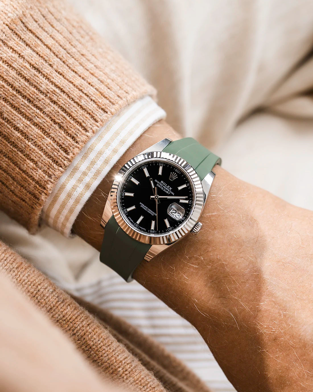 Green integrated FKM rubber strap with original clasp on Rolex Datejust 41 126334 fluted bezel black dial wrist shot