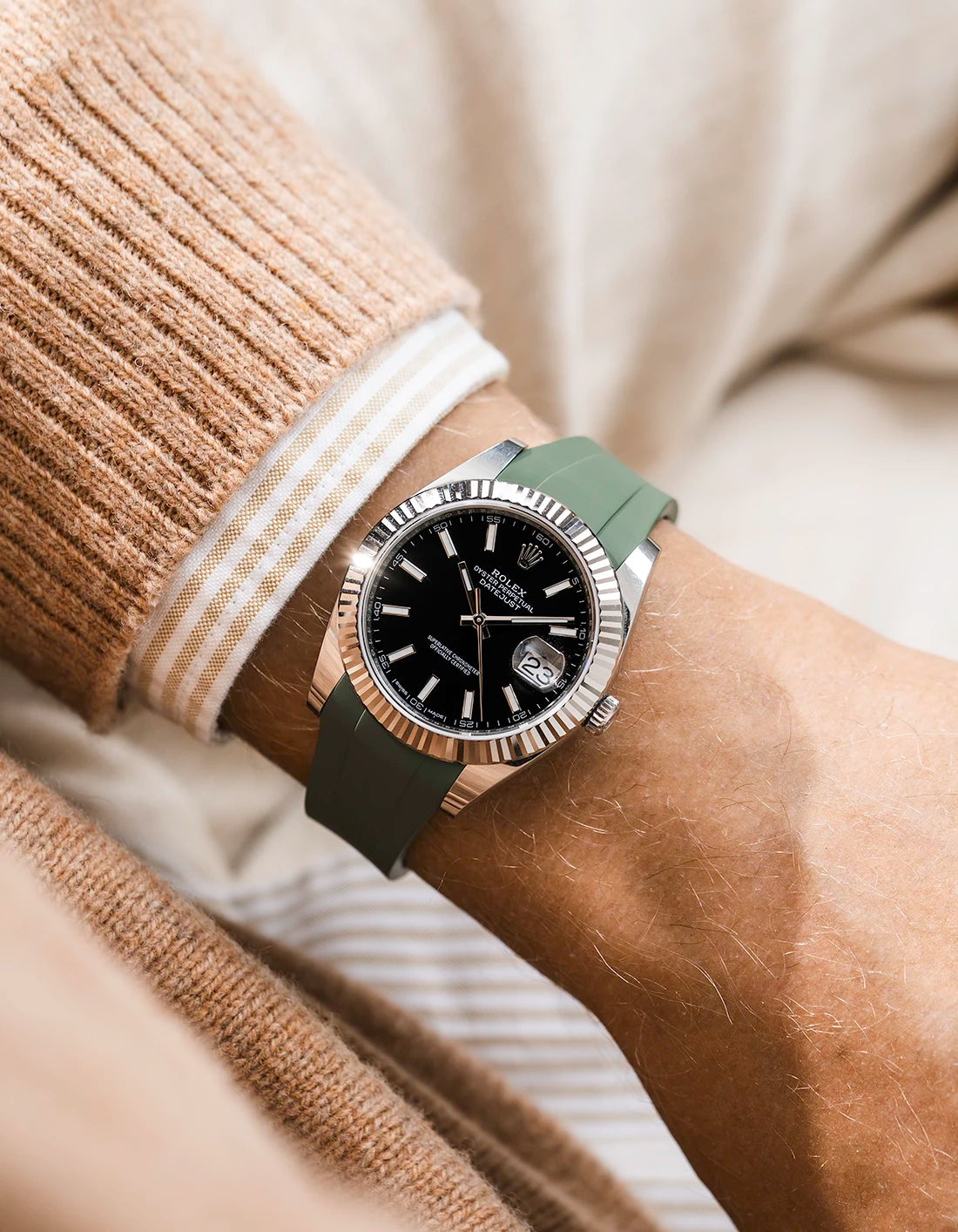 Green integrated FKM rubber strap with original clasp on Rolex Datejust 41 126334 fluted bezel black dial wrist shot