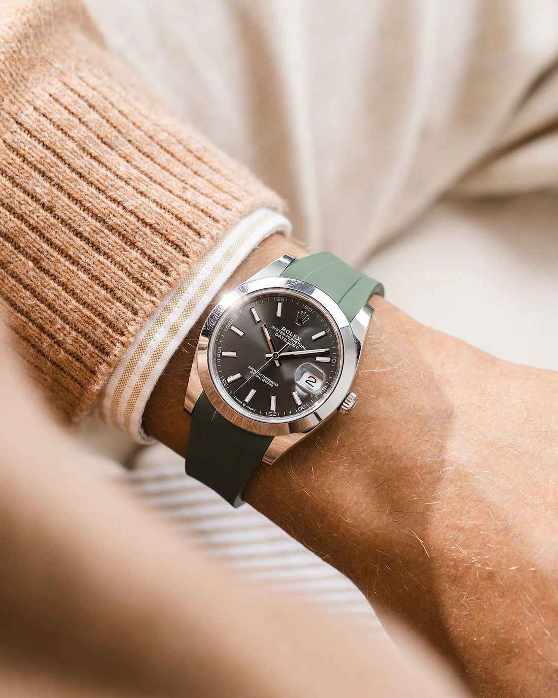 Green integrated FKM rubber strap with original clasp on Rolex Datejust 41 126300 smooth bezel grey dial wrist shot