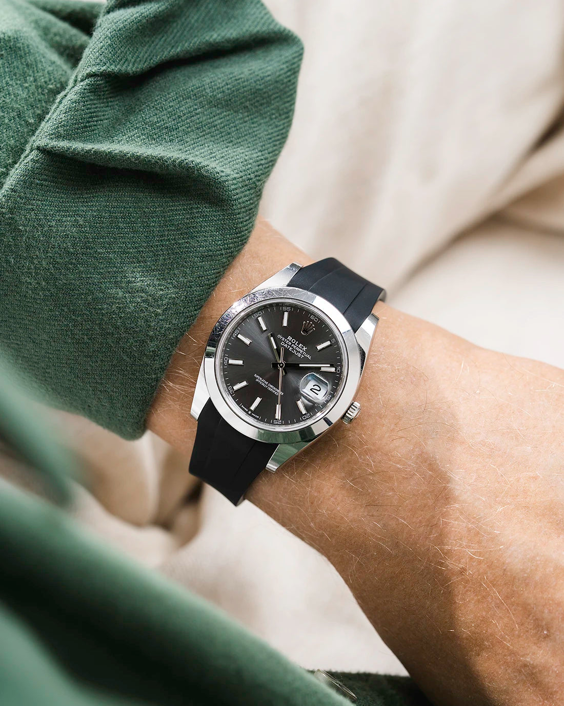 Black integrated FKM rubber strap with original clasp on Rolex Datejust 41 126300 smooth bezel grey dial wrist shot