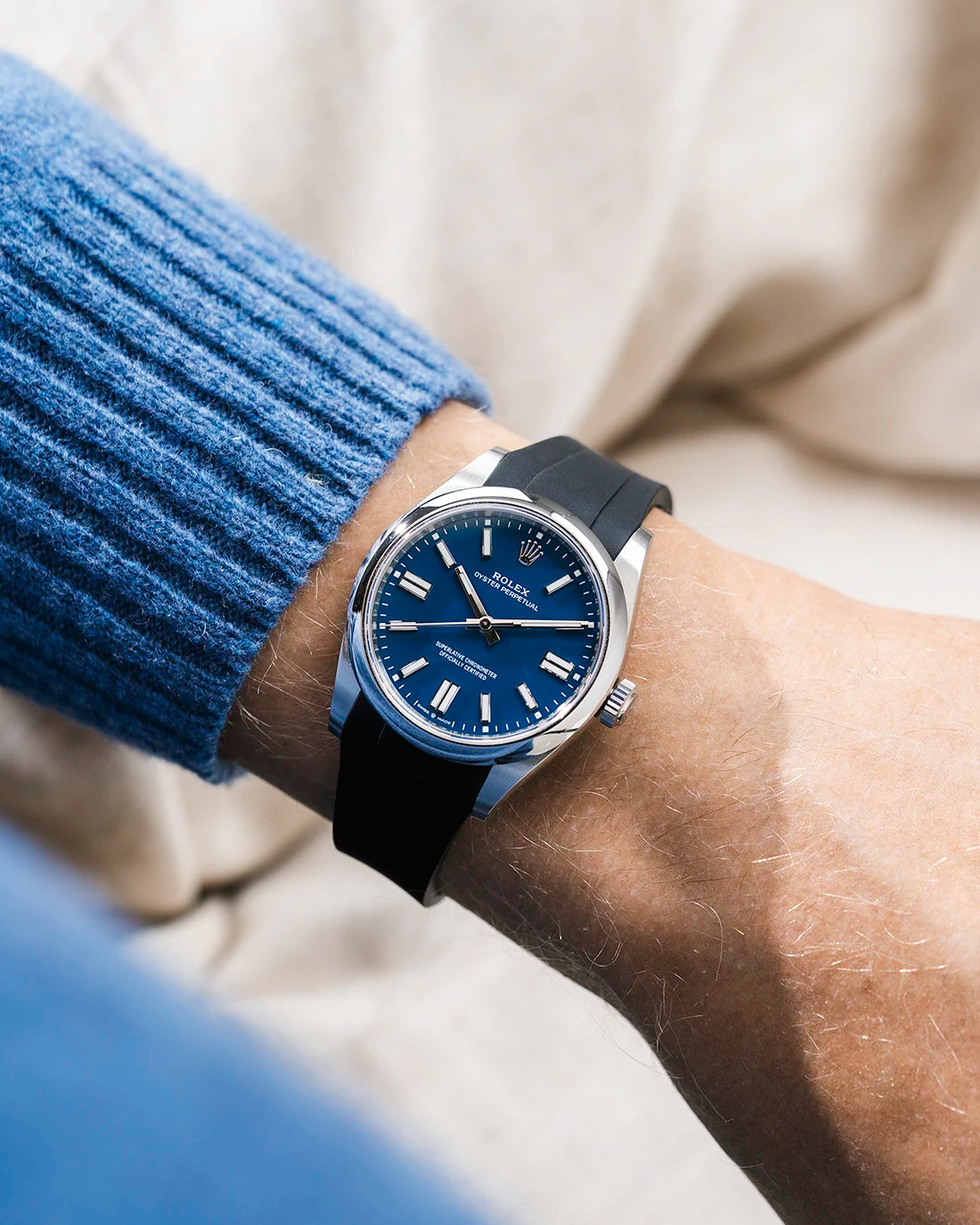 Black integrated FKM rubber strap with original clasp on Rolex Oyster Perpetual 41 134300 blue dial wrist shot