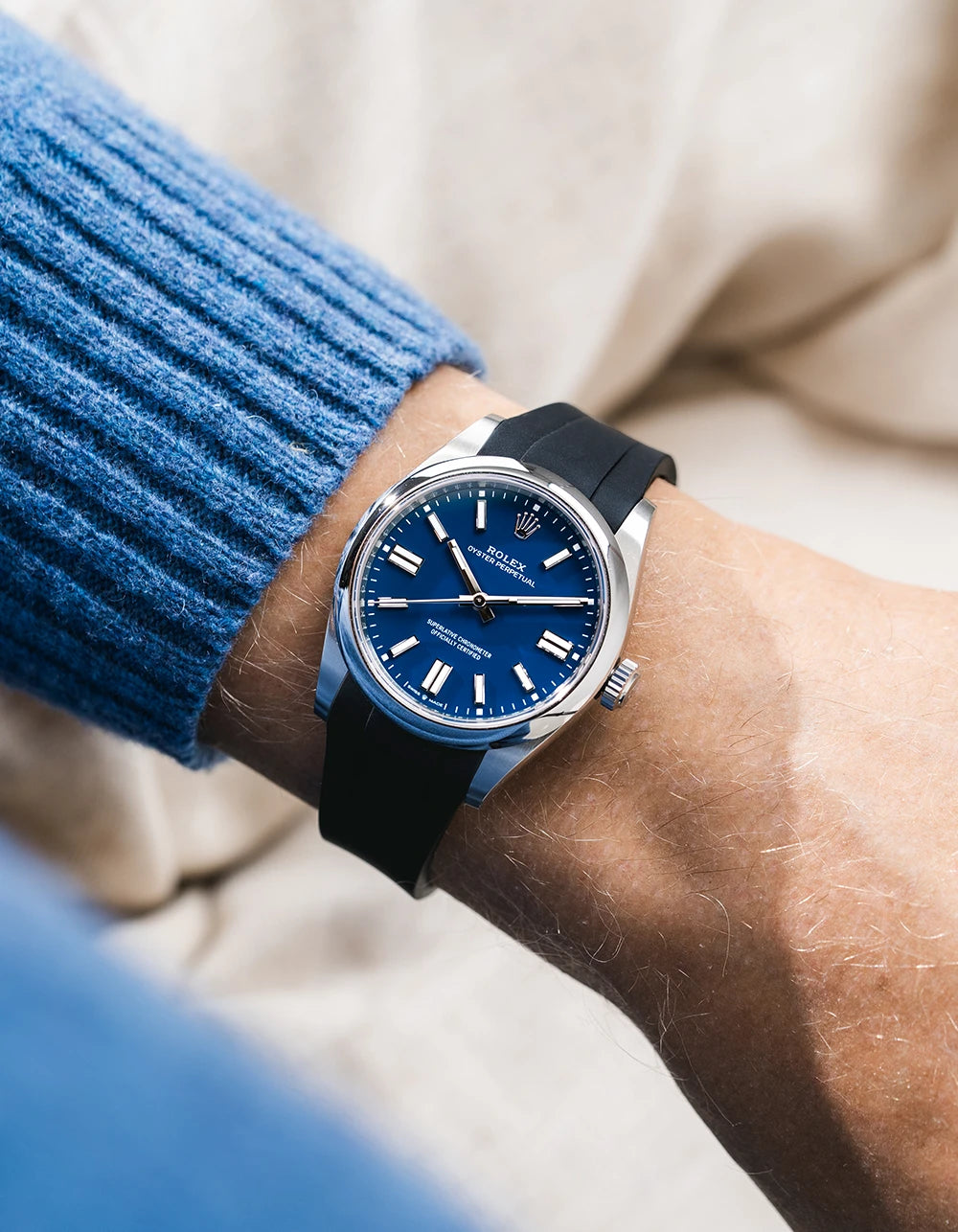 Black integrated FKM rubber strap with original clasp on Rolex Oyster Perpetual 41 134300 blue dial wrist shot