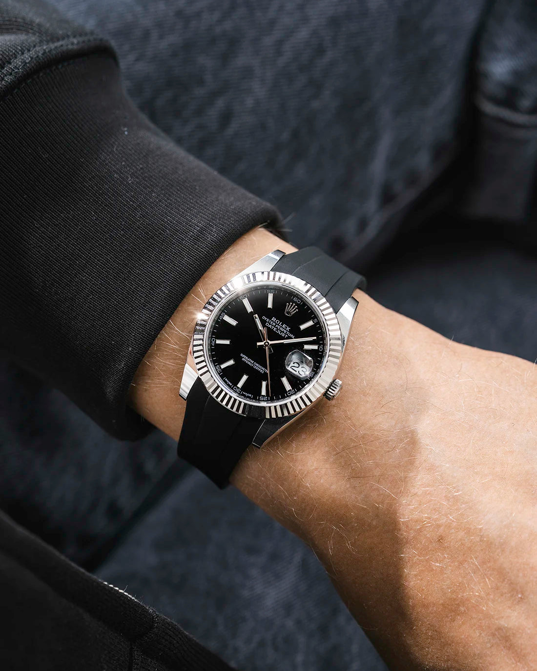 Black integrated FKM rubber strap with original clasp on Rolex Datejust 41 126334 fluted bezel black dial wrist shot