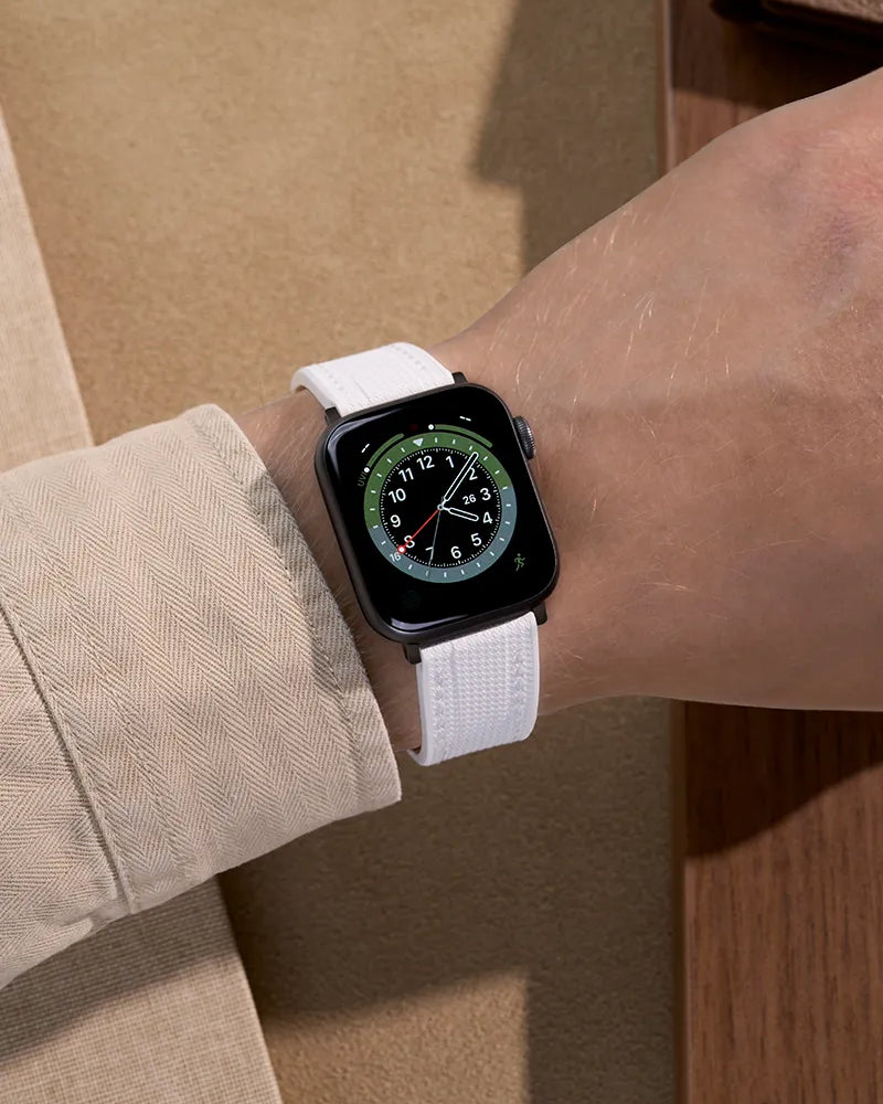 White rubber apple watch band on wrist