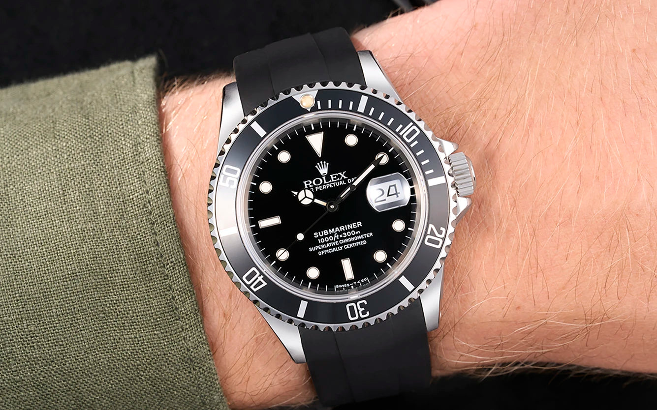 Wristbuddys discount code page showing a Rolex Submariner watch with black rubber strap, representing premium watch straps on sale at Wristbuddys